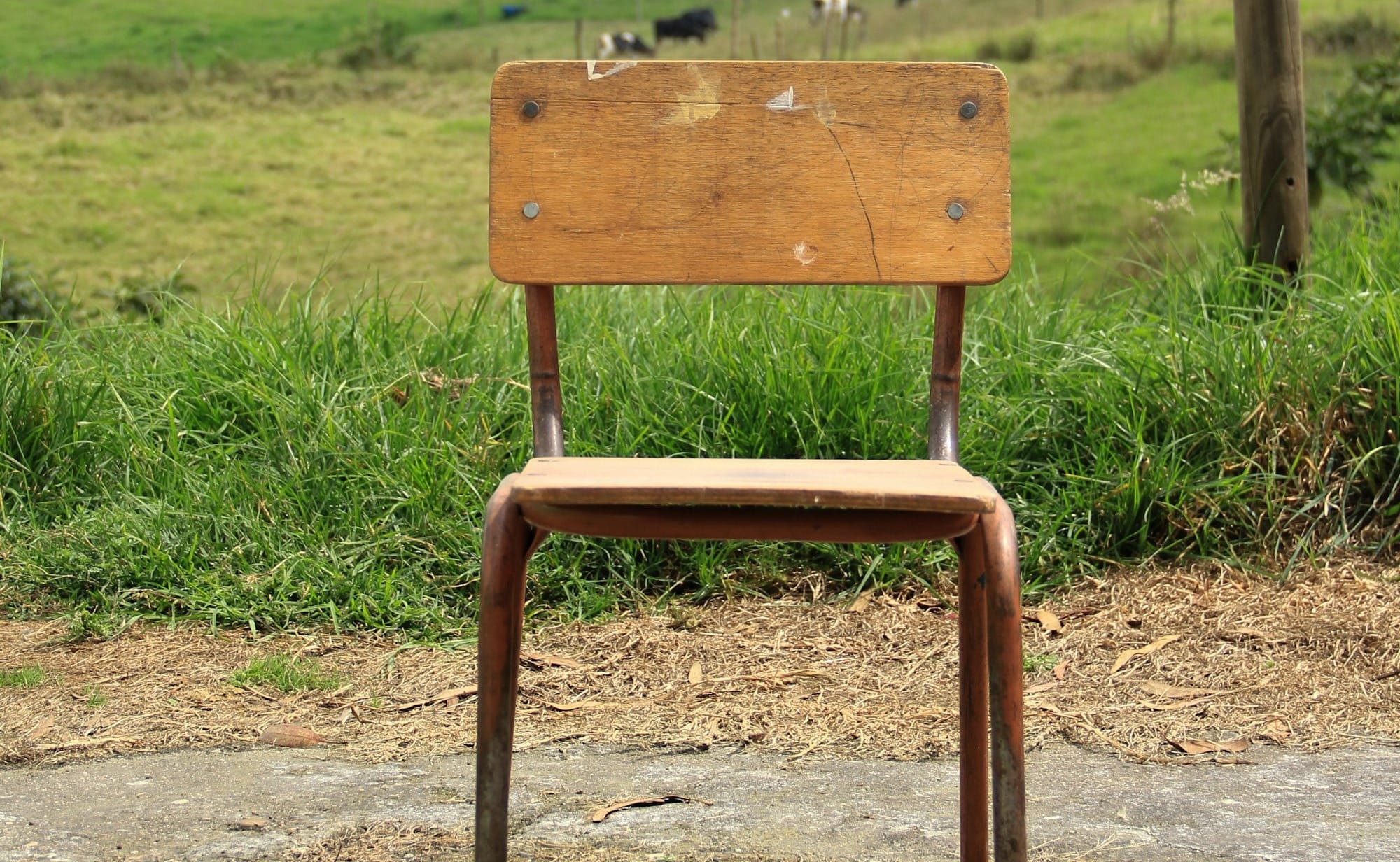 brown chair on gray surface