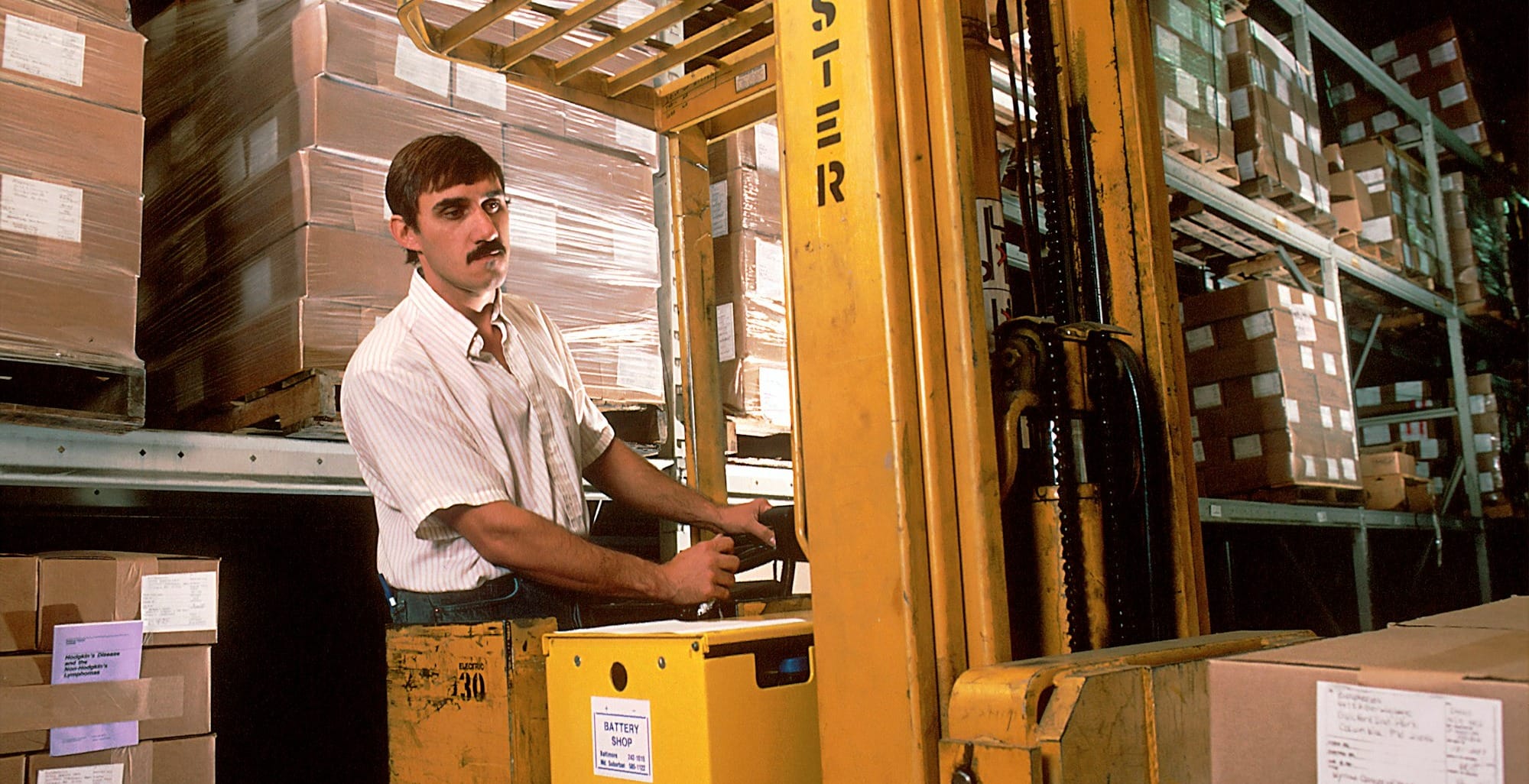 yellow driving forklift