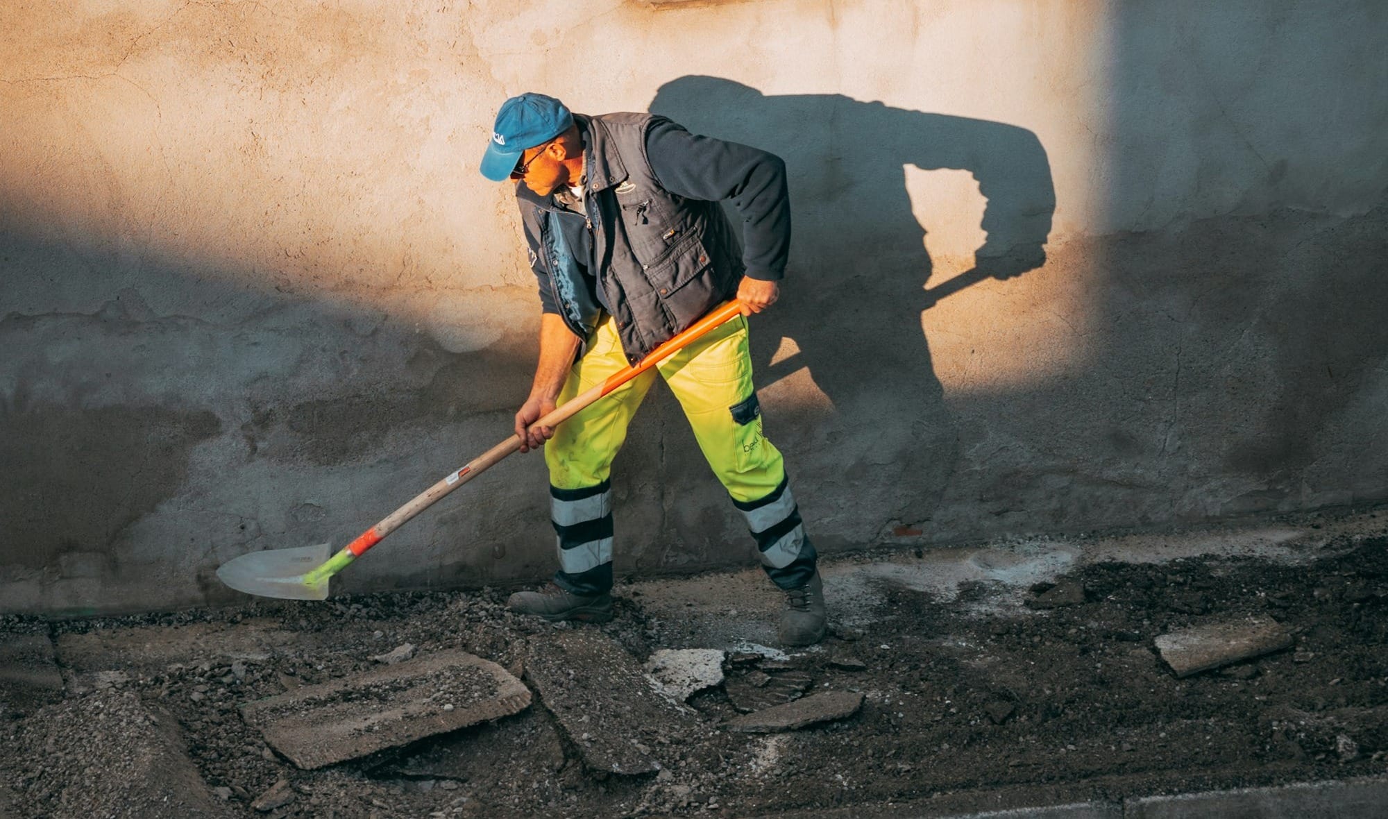 a person sweeping the street